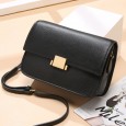 Spring and summer new women's bag tide Hong Kong style retro simple first layer leather crossbody bag lock tofu bag small square bag