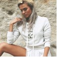 Hot selling women's hooded exposed navel sexy short sweater female long-sleeved tied rope round neck top