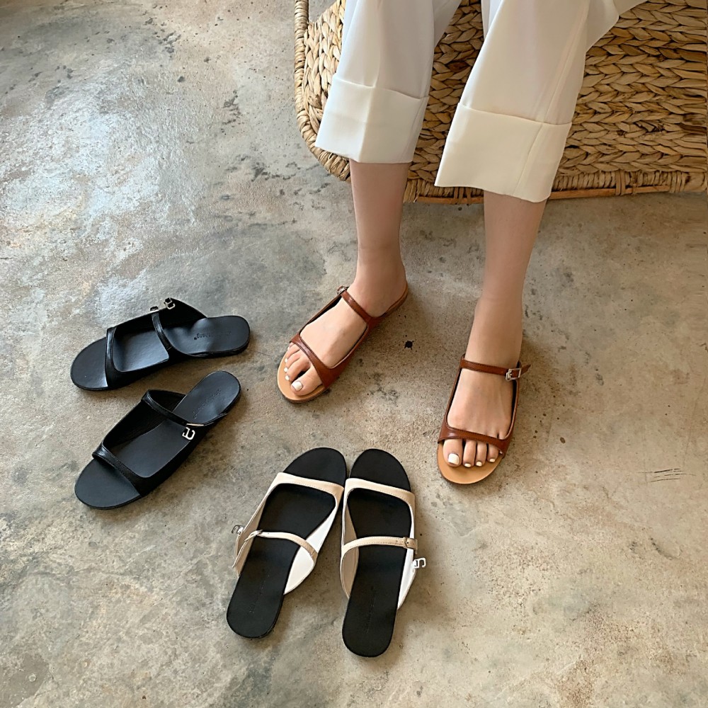 Slippers women wear new summer wild flat bottom tow beach female Roman fashion lazy sandals tide