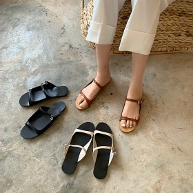 Slippers women wear new summer wild flat bottom tow beach female Roman fashion lazy sandals tide